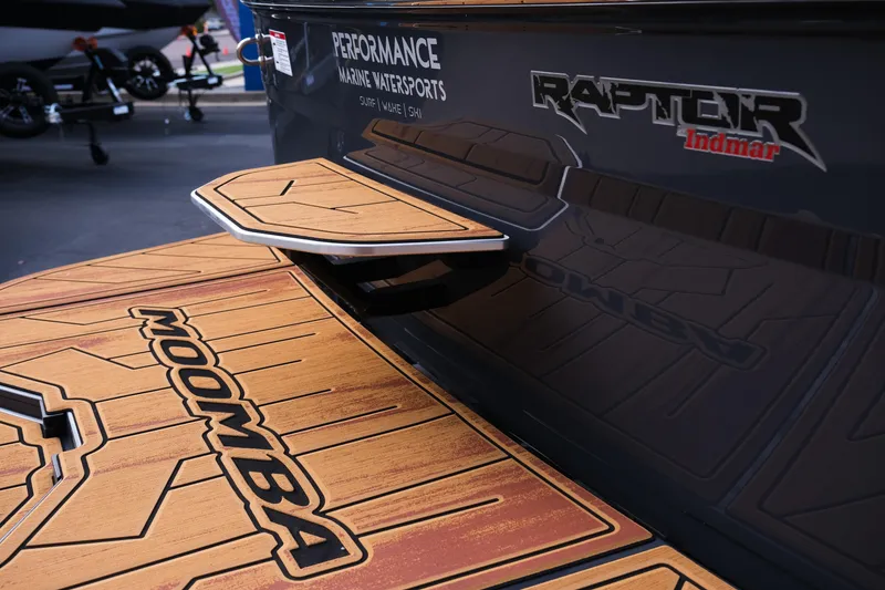 Slide: The Image of 2026 Moomba Tykon boat with Raptor Indmar engine, featuring teak-style deck. - 39