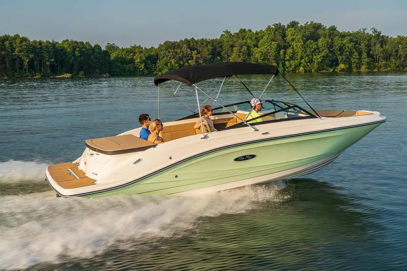 Slide: The Image of Manufacturer Provided Image: 2024 Sea Ray SPX 230 boat cruising on a lake with passengers. - 10