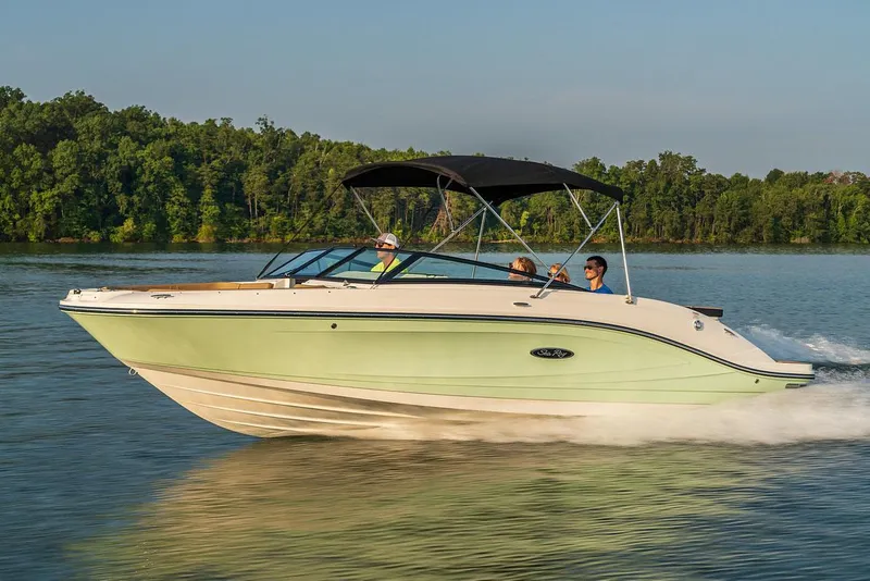 Slide: The Image of Manufacturer Provided Image: 2024 Sea Ray SPX 230 boat cruising on a lake with passengers. - 11