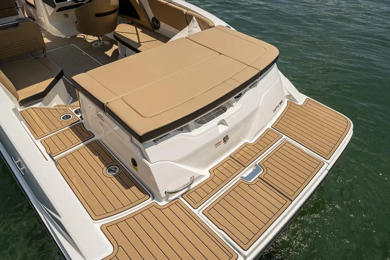 Slide: The Image of Manufacturer Provided Image: 2024 Sea Ray SPX 230 boat with tan seating and teak-style decking. - 14