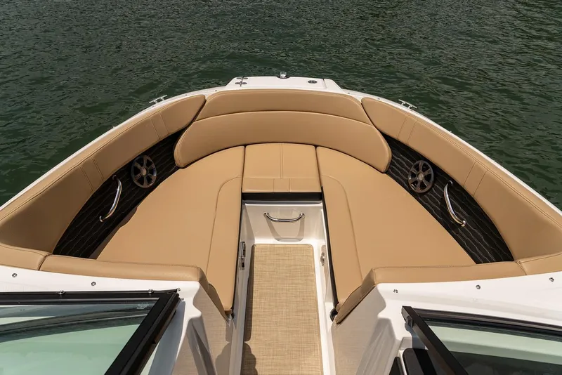 Slide: The Image of Manufacturer Provided Image: 2024 Sea Ray SPX 230 boat bow seating area with tan upholstery. - 15