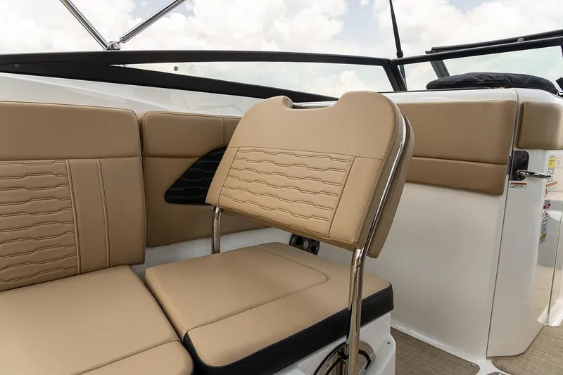 Slide: The Image of Manufacturer Provided Image: 2024 Sea Ray SPX 230 boat interior with tan leather seating. - 22