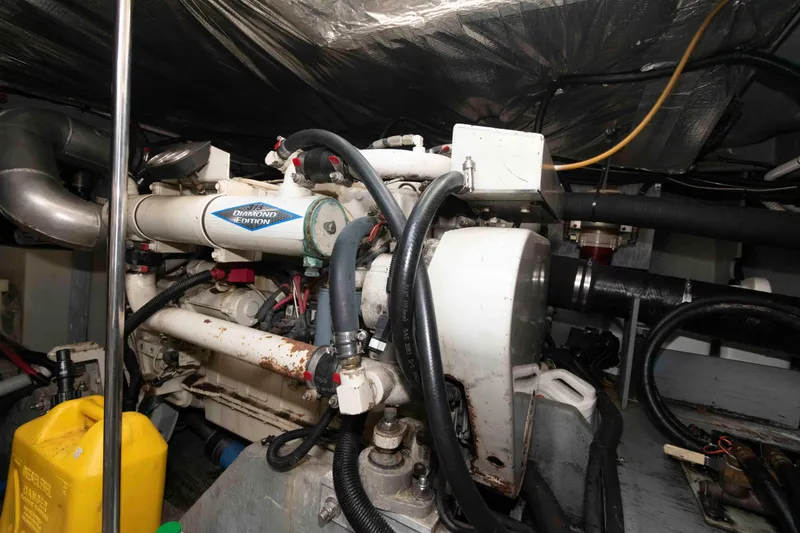 Slide: The Image of Engine room of 1995 Sea Ray 440 Sundancer with Diamond Edition engine. - 17