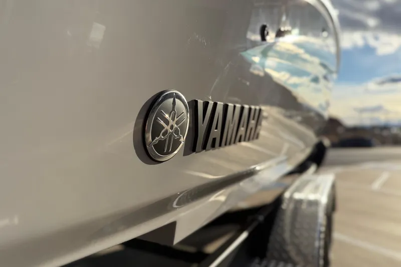 Slide: The Image of 2026 Yamaha Boats 255XD close-up, showcasing sleek design and logo detail. - 15