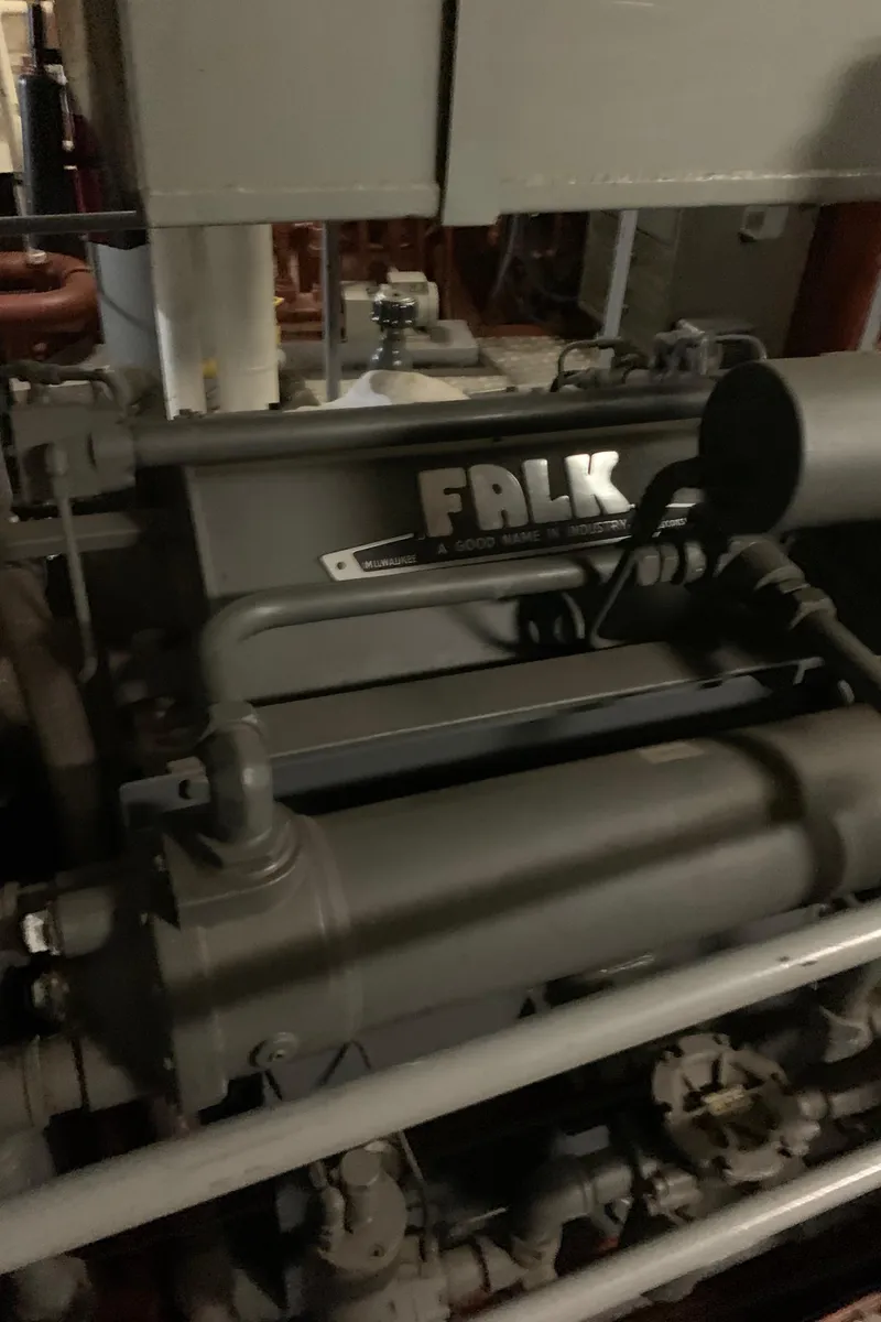 Slide: The Image of Engine room of 1955 Tugboat L-T 100 Steel Army Tug, featuring Falk machinery. - 31