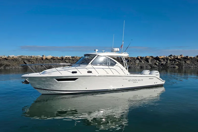 Slide: The Image of 2024 Pursuit OS 325 Offshore boat interior with luxurious seating and modern design. - 28