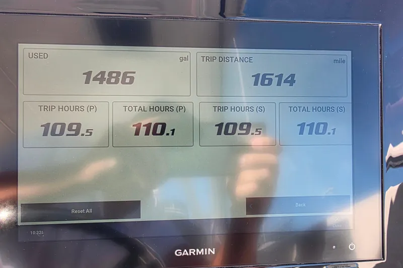 Slide: The Image of Garmin display showing fuel usage and trip data for 2024 Pursuit OS 325 Offshore. - 48