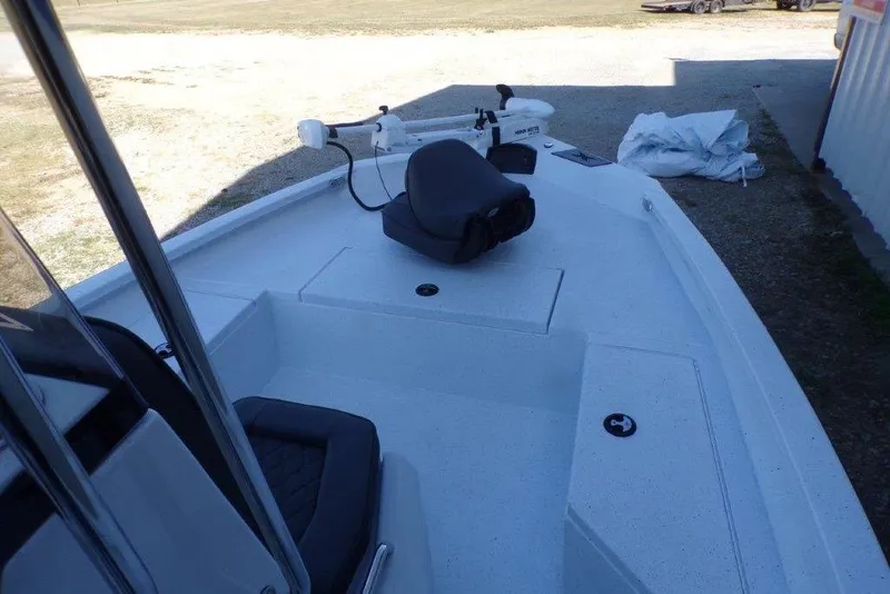 Slide: The Image of 2026 Xpress H20B Bay boat deck with seating and trolling motor. - 19