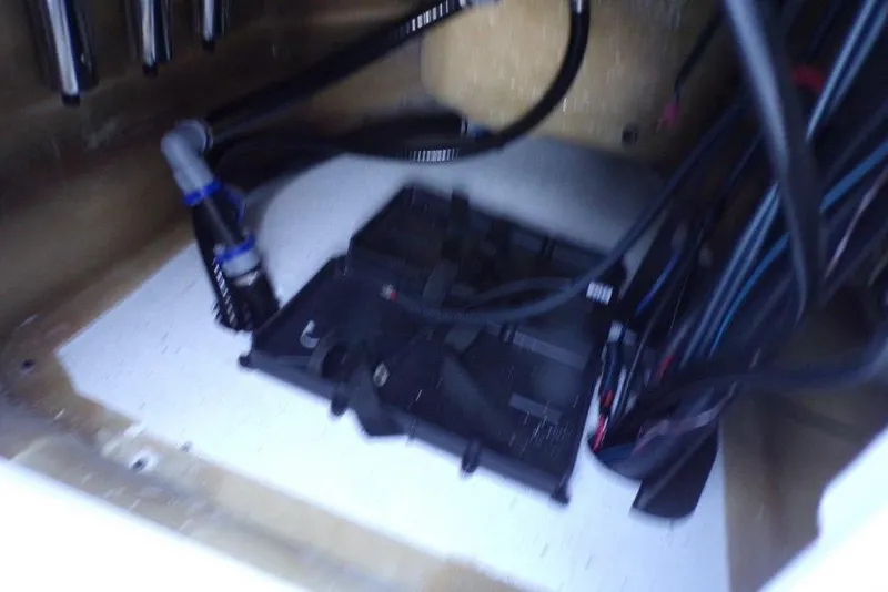 Slide: The Image of 2026 Xpress H20B Bay boat interior wiring and components. - 20