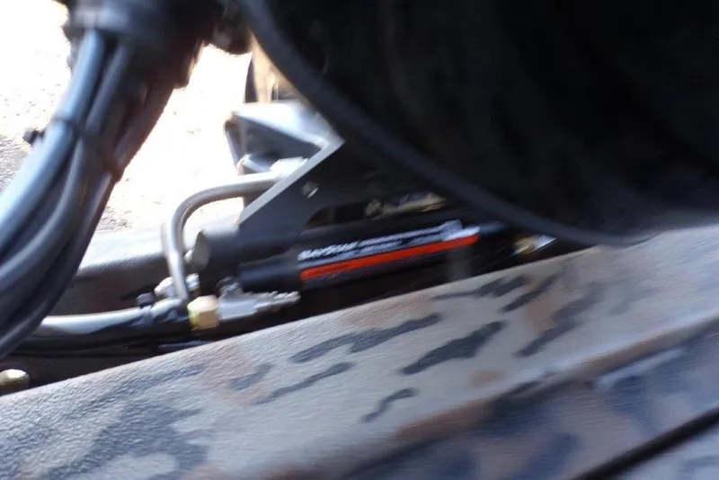 Slide: The Image of Close-up of 2026 Xpress H20B Bay boat engine components and hydraulic system. - 6