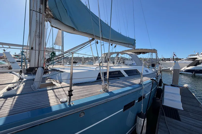Slide: The Image of 2008 Hanse 540e sailboat docked at marina under clear blue sky. - 10