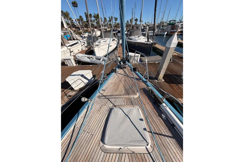 Slide: The Image of 2008 Hanse 540e sailboat docked at marina, showcasing deck and rigging. - 16