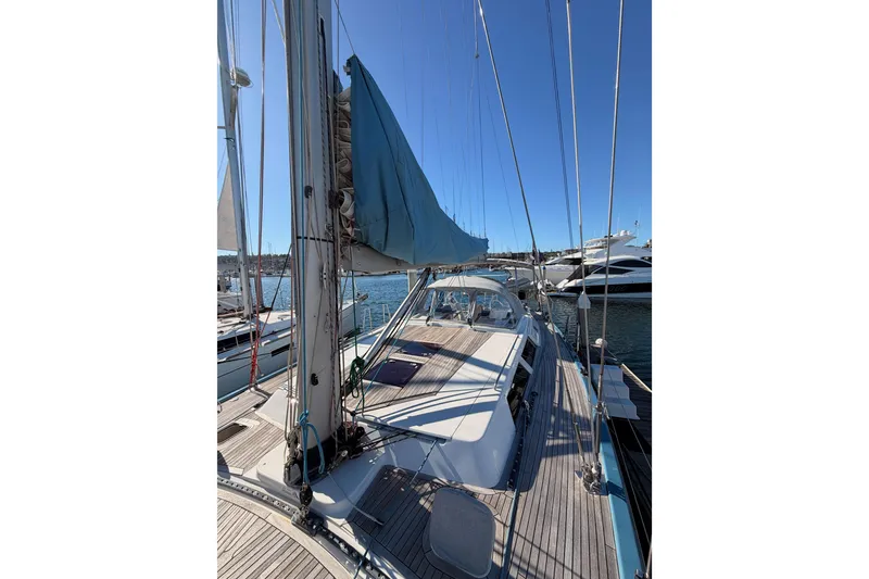 Slide: The Image of 2008 Hanse 540e sailboat docked at marina, clear blue sky. - 23