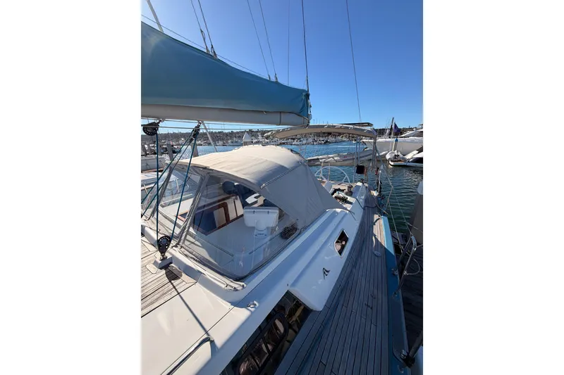 Slide: The Image of 2008 Hanse 540e yacht docked at marina under clear blue sky. - 24