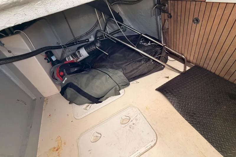 Slide: The Image of Interior storage area of 2008 Hanse 540e yacht with equipment and bags. - 30
