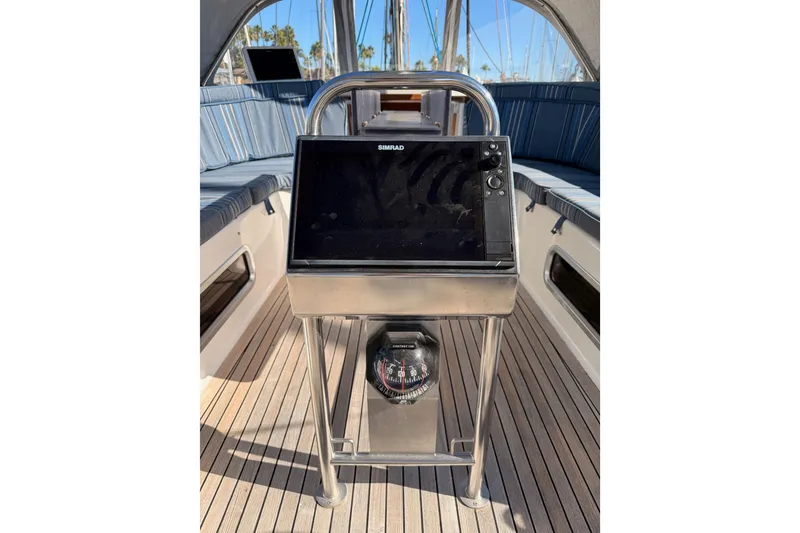 Slide: The Image of Cockpit of 2008 Hanse 540e sailboat with navigation equipment and compass. - 43