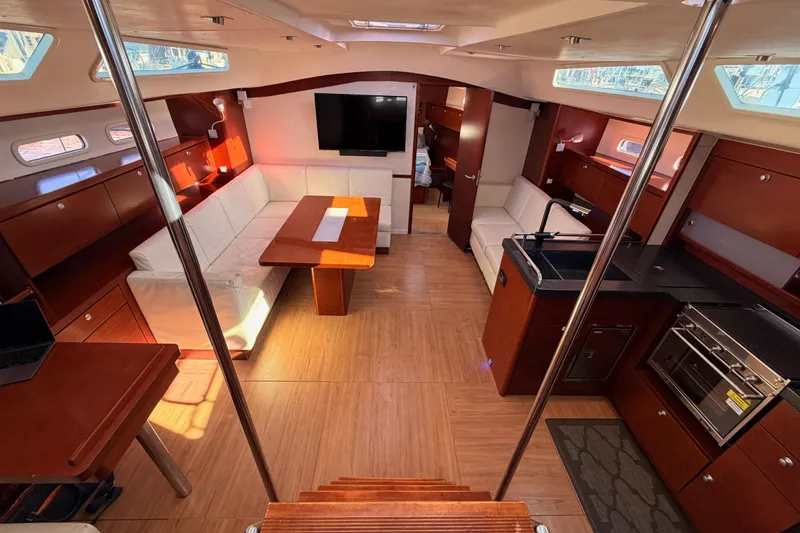 Slide: The Image of Luxurious interior of 2008 Hanse 540e yacht with modern kitchen and seating area. - 46