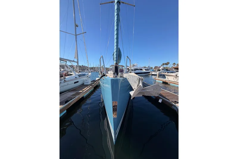 Slide: The Image of 2008 Hanse 540e sailboat docked in a marina under clear blue skies. - 5