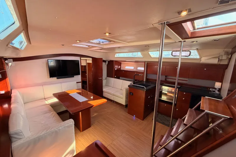 Slide: The Image of Luxurious interior of 2008 Hanse 540e yacht with modern furnishings and ample natural light. - 60