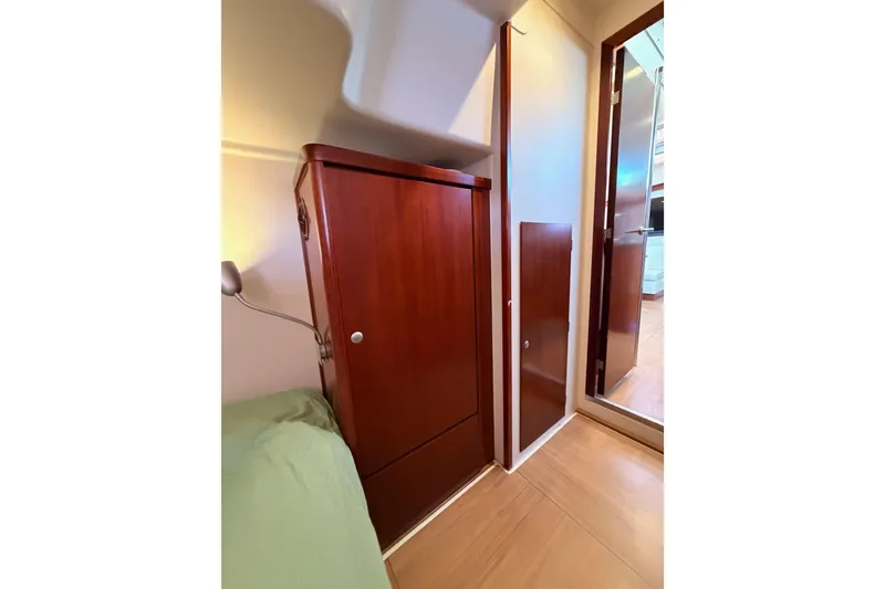 Slide: The Image of Interior of 2008 Hanse 540e yacht featuring wooden cabinetry and modern design. - 65