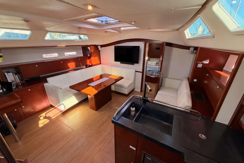 Slide: The Image of Luxurious interior of 2008 Hanse 540e yacht with elegant seating and modern amenities. - 74