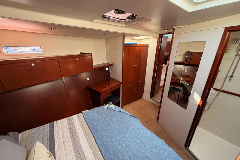 Slide: The Image of Luxurious 2008 Hanse 540e yacht interior with wood finish and modern amenities. - 86