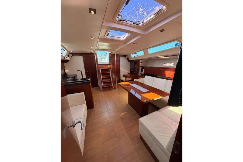 Slide: The Image of Interior of 2008 Hanse 540e yacht with modern wood finish and skylights. - 88