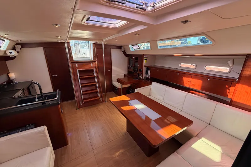 Slide: The Image of Luxurious interior of 2008 Hanse 540e yacht with elegant wood finishes and spacious seating. - 89