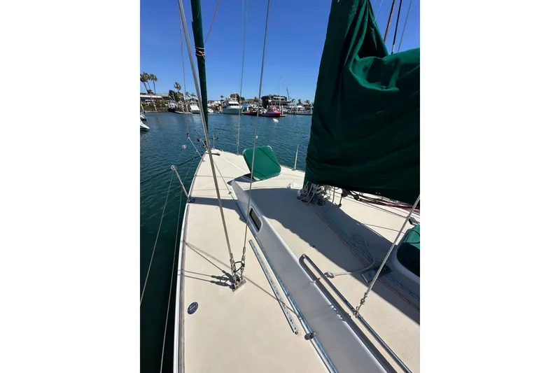 Slide: The Image of Sailboat deck view of 1996 J Boats J/120 in marina setting. - 11