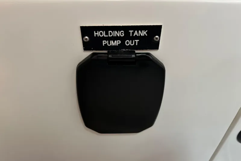 Slide: The Image of Holding tank pump-out access on 1996 J Boats J/120 yacht. - 70