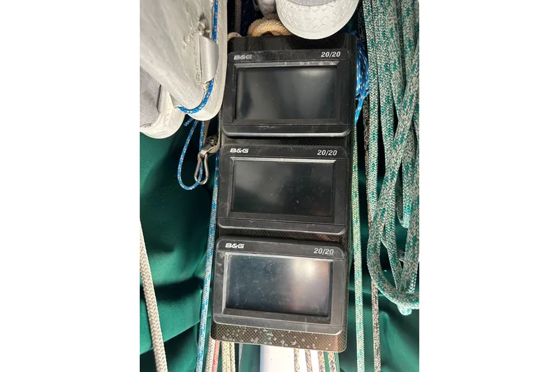 Slide: The Image of B&G marine displays and ropes on a 1996 J Boats J/120 sailboat. - 97