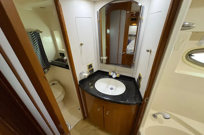 Slide: The Image of Luxurious bathroom in 2002 Carver 506 Motor Yacht with elegant fixtures and modern design. - 49