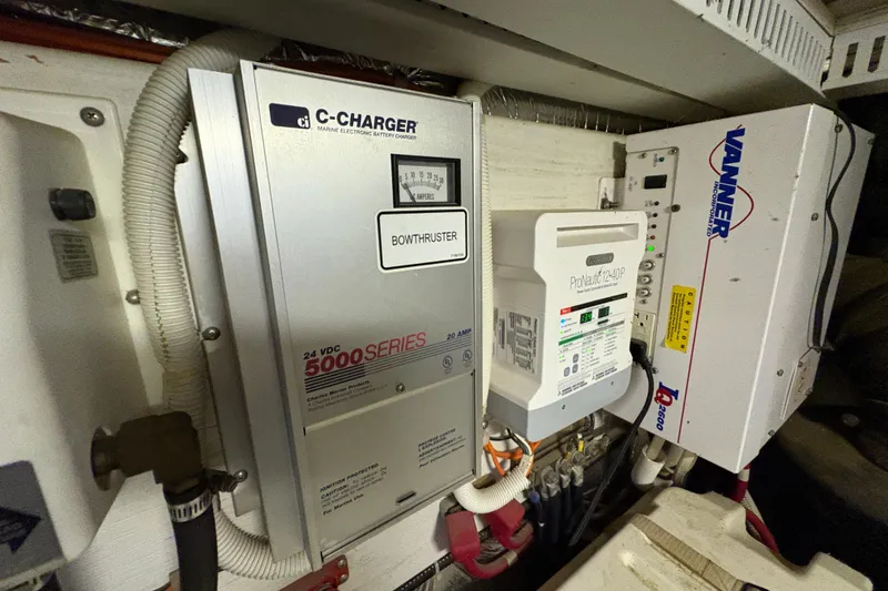 Slide: The Image of Electrical systems in a 2002 Carver 506 Motor Yacht engine room. - 59