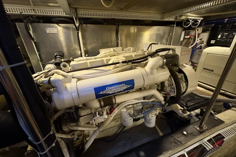 Slide: The Image of Engine room of a 2002 Carver 506 Motor Yacht with Kohler power system. - 64