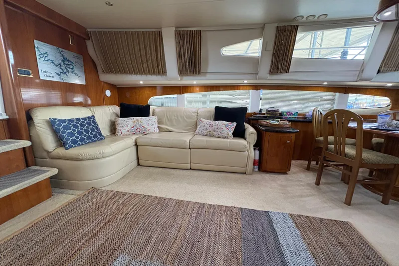Slide: The Image of Luxurious interior of 2002 Carver 506 Motor Yacht with plush seating and elegant decor. - 36