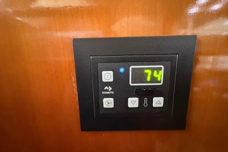 Slide: The Image of Digital thermostat on 2002 Carver 506 Motor Yacht, displaying 74 degrees. - 57