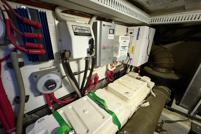 Slide: The Image of Engine room of 2002 Carver 506 Motor Yacht with electrical systems and components. - 58