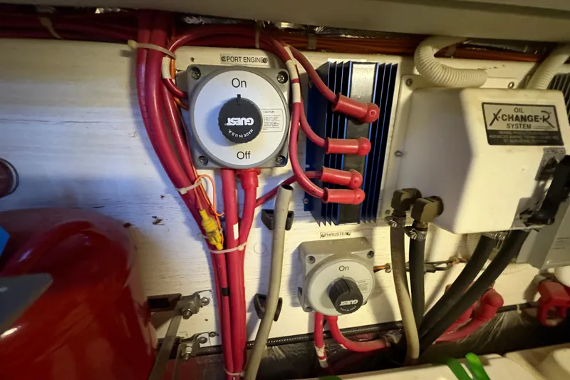 Slide: The Image of Engine room of 2002 Carver 506 Motor Yacht with electrical components and wiring. - 60