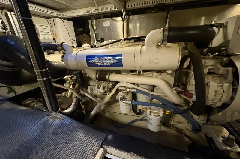 Slide: The Image of Engine room of a 2002 Carver 506 Motor Yacht, featuring a Diamond Performance Series engine. - 71