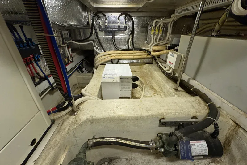 Slide: The Image of Engine room of 2002 Carver 506 Motor Yacht with wiring and equipment. - 75