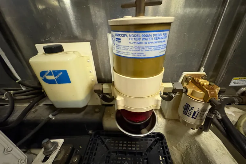 Slide: The Image of Engine room of 2002 Carver 506 Motor Yacht with Racor fuel filter system. - 79