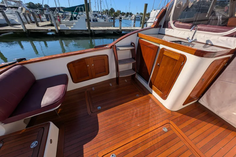 Slide: The Image of Luxurious Santa Cruz Coastal Flyer 41 yacht interior with polished wood and marina view. - 15