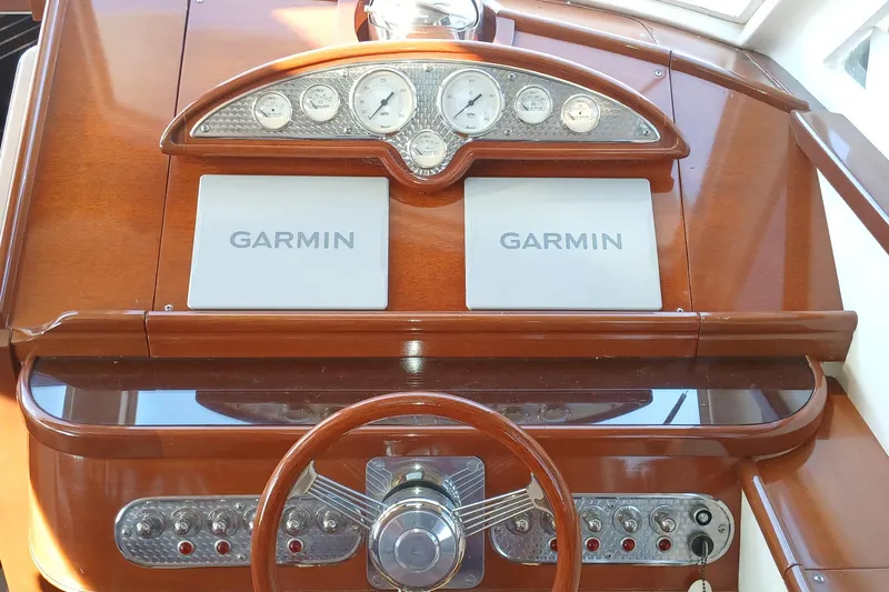 Slide: The Image of Helm of 2000 Santa Cruz Coastal Flyer 41 with Garmin navigation displays. - 24