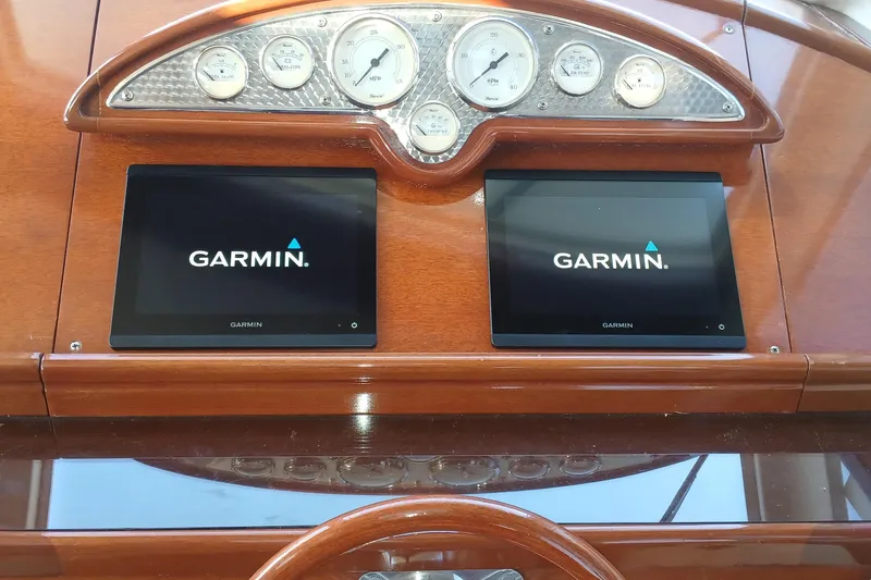 Slide: The Image of Dashboard of 2000 Santa Cruz Coastal Flyer 41 with Garmin displays and gauges. - 25