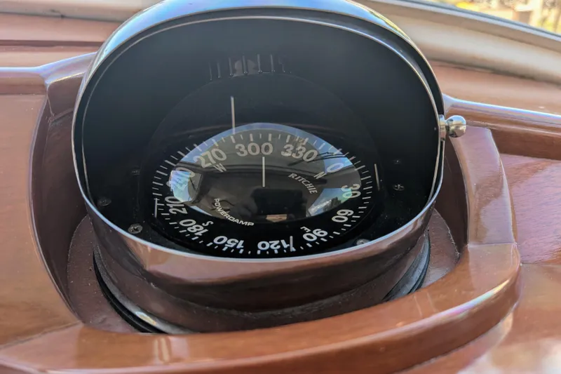 Slide: The Image of Compass on Santa Cruz Coastal Flyer 41, 2000 model, showing direction in wooden dashboard. - 29