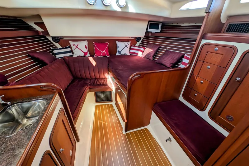 Slide: The Image of Luxurious interior of 2000 Santa Cruz Coastal Flyer 41 yacht with plush seating and wood accents. - 34