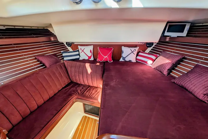 Slide: The Image of Luxurious interior of 2000 Santa Cruz Coastal Flyer 41 with plush seating and nautical decor. - 36