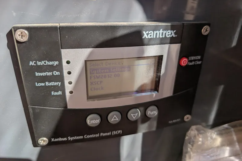 Slide: The Image of Xantrex system control panel on Santa Cruz Coastal Flyer 41, year 2000, displaying settings. - 54