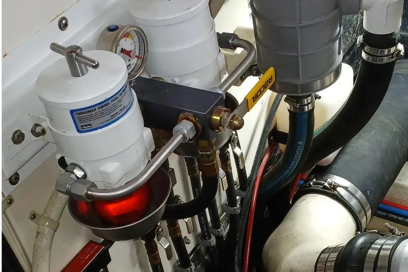 Slide: The Image of Engine compartment of a 2000 Santa Cruz Coastal Flyer 41 with fuel filtration system. - 58