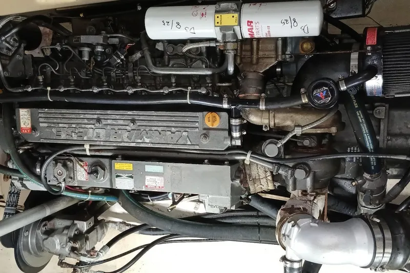 Slide: The Image of Engine of a 2000 Santa Cruz Coastal Flyer 41, showcasing intricate mechanical components. - 59